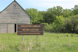 Nelson sign and barn