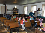 Cardinal 1st graders visit Millrock to learn about one-room schoolhouses